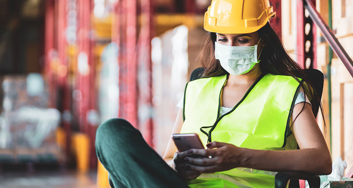 Construction worker on phone for telehealth visit