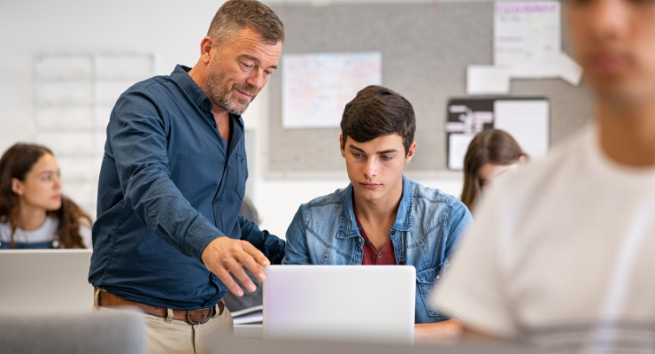 Teacher with student