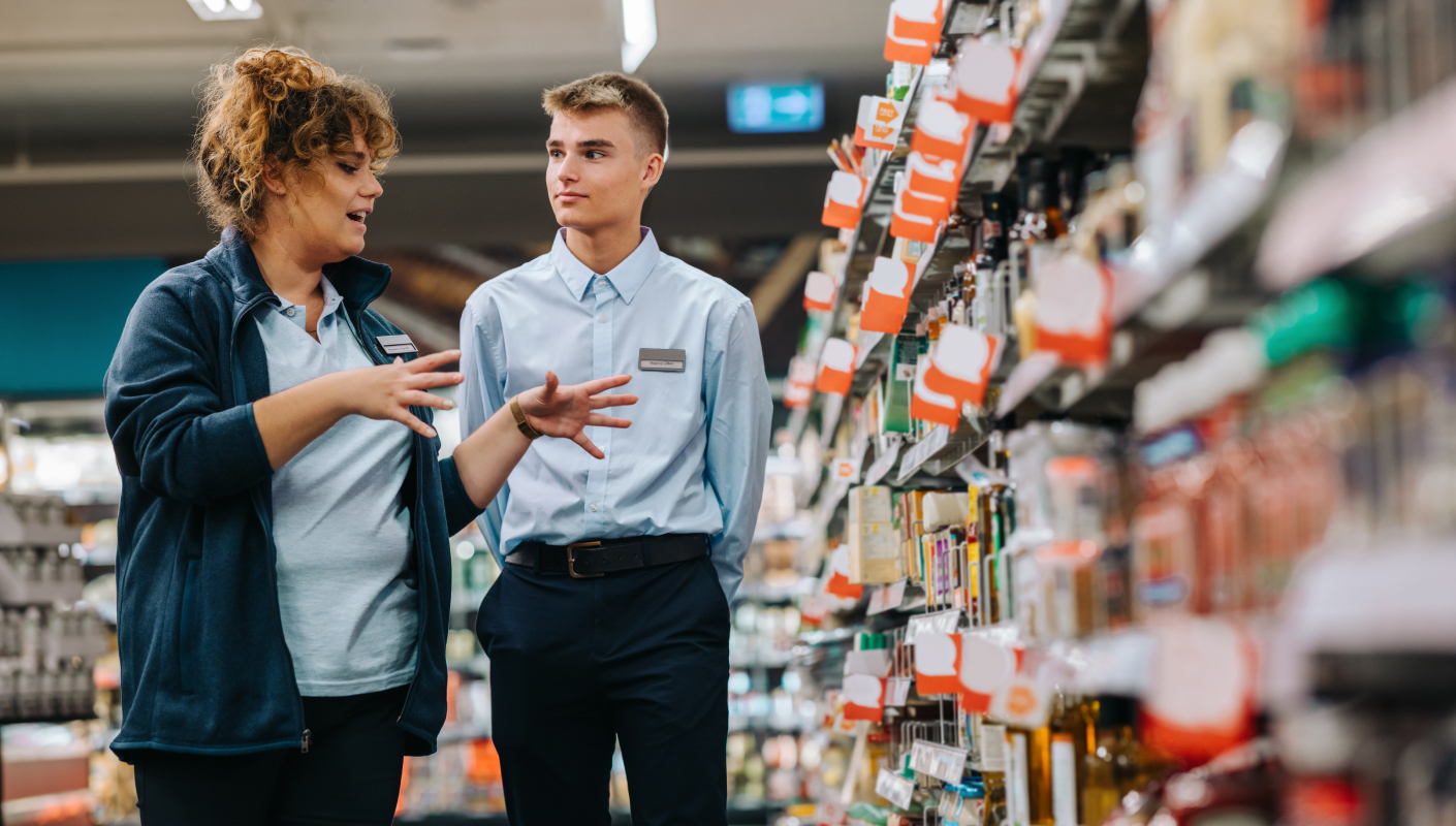 Grocery workers talking