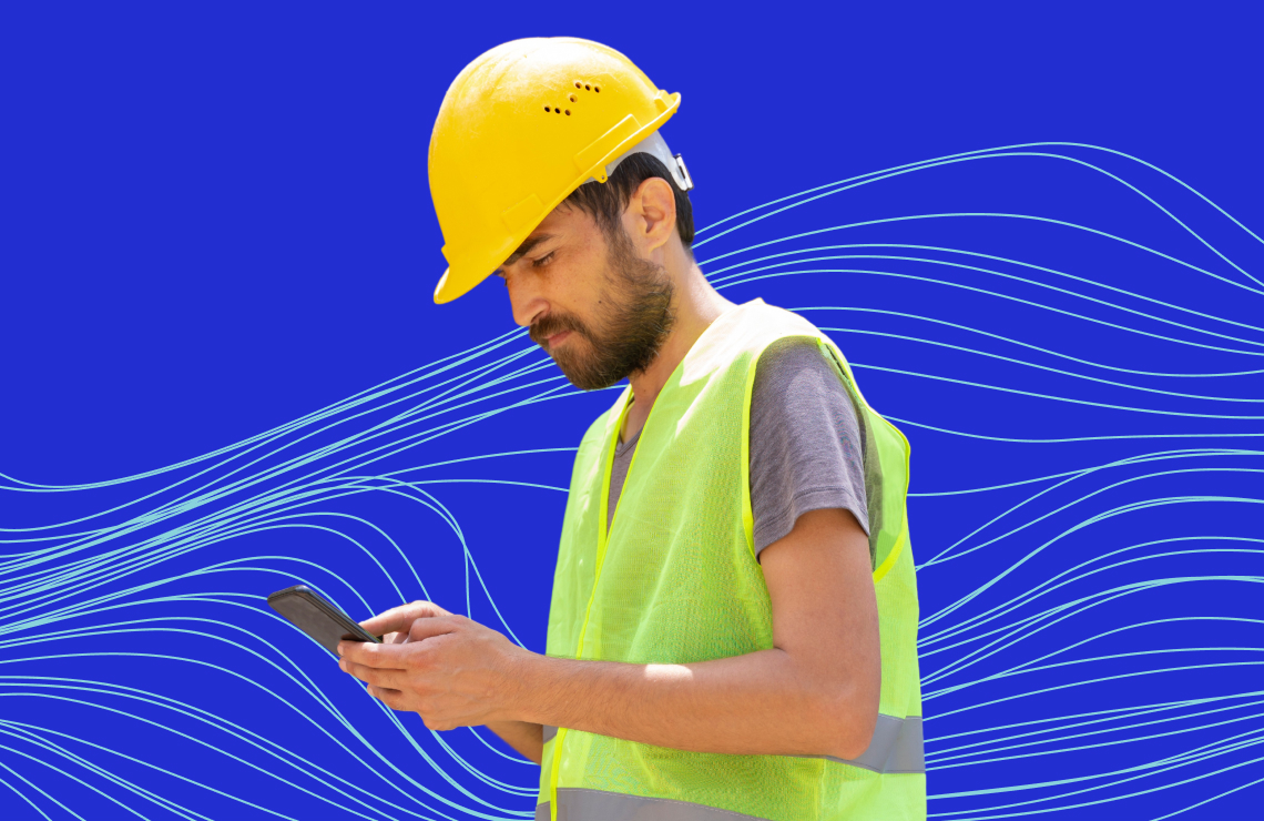 Construction worker on phone