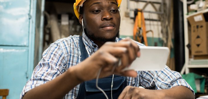 Man having telehealth visit at work on lunch break