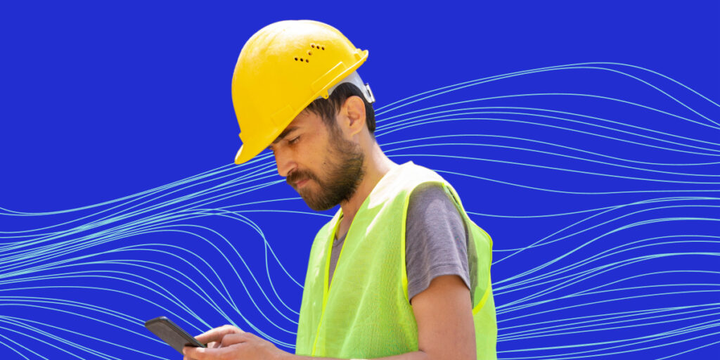 construction worker on phone chatting with doctor