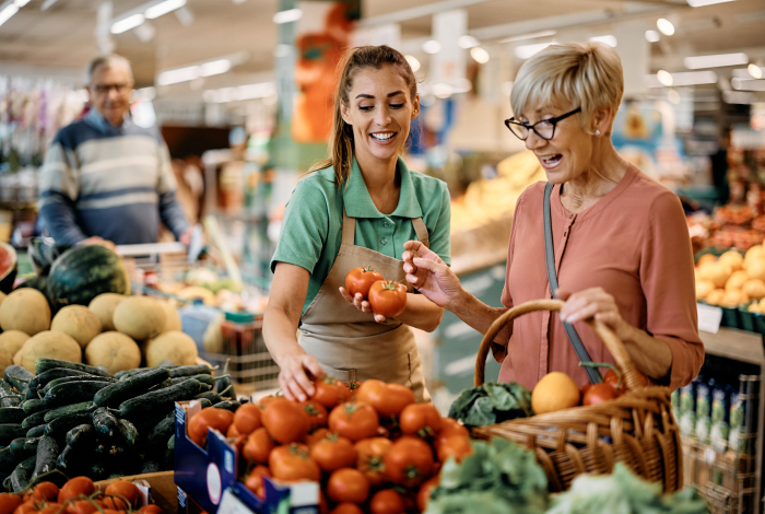 grocery worker and customer