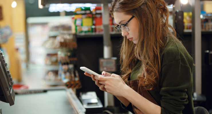 Grocery worker chatting with a doctor