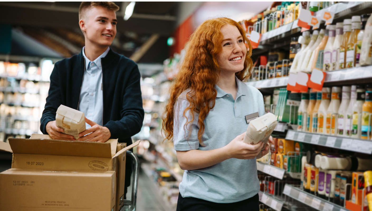 Grocery Worker Happy at work because of employee benefits