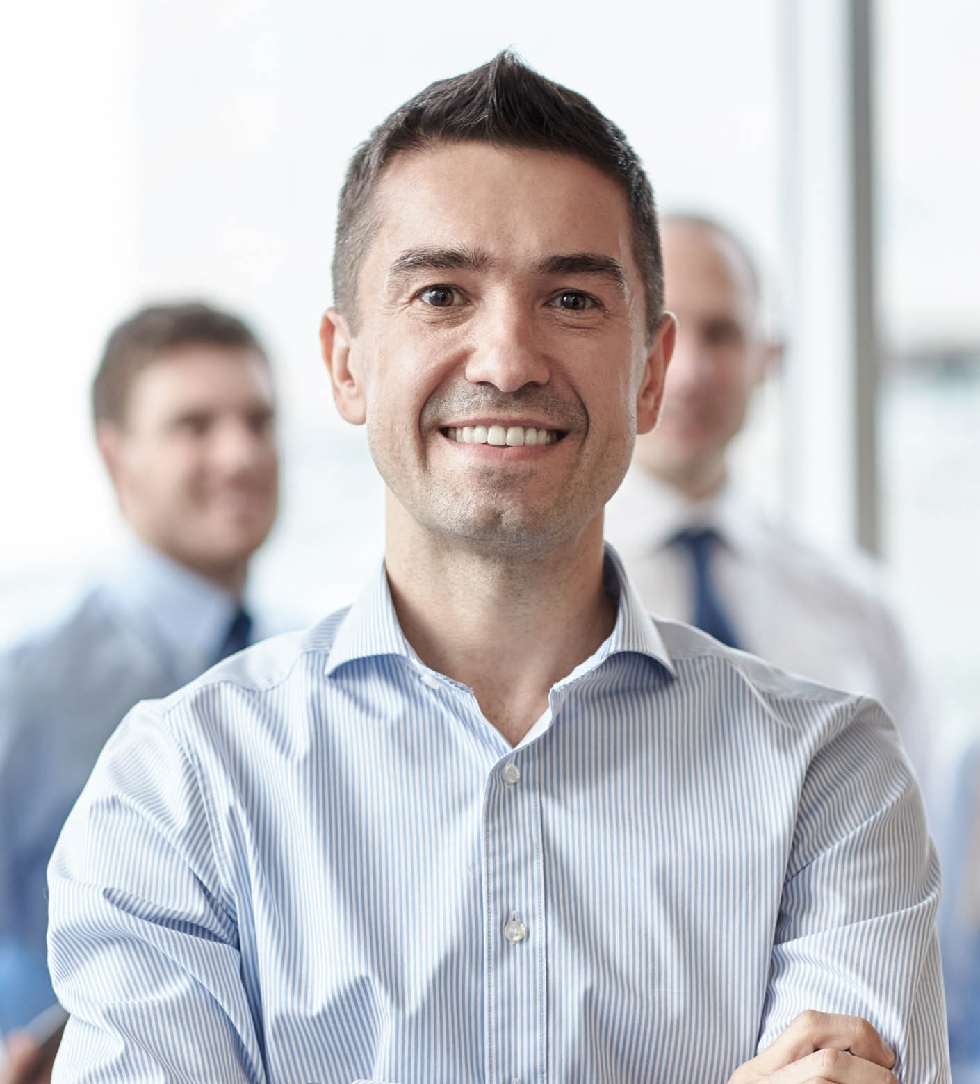 Employee Benefits Manager smiling